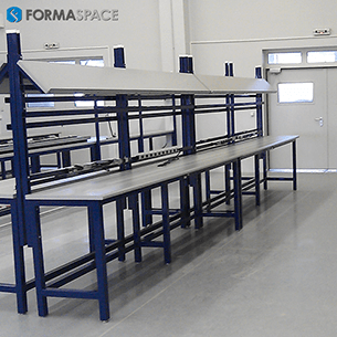 oil and gas maintenance facility industrial workbenches with angled upper shelves