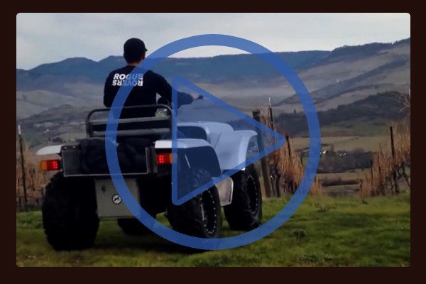 Here the FarmDogg electric All Terrain Vehicle (ATV) prototype takes tour of a vineyard. Unlike gasoline ATVs this model is quiet and vibration free. Video opens in a new window. Here the FarmDogg electric All Terrain Vehicle (ATV) prototype takes tour of a vineyard. Unlike gasoline ATVs this model is quiet and vibration free. Video opens in a new window.