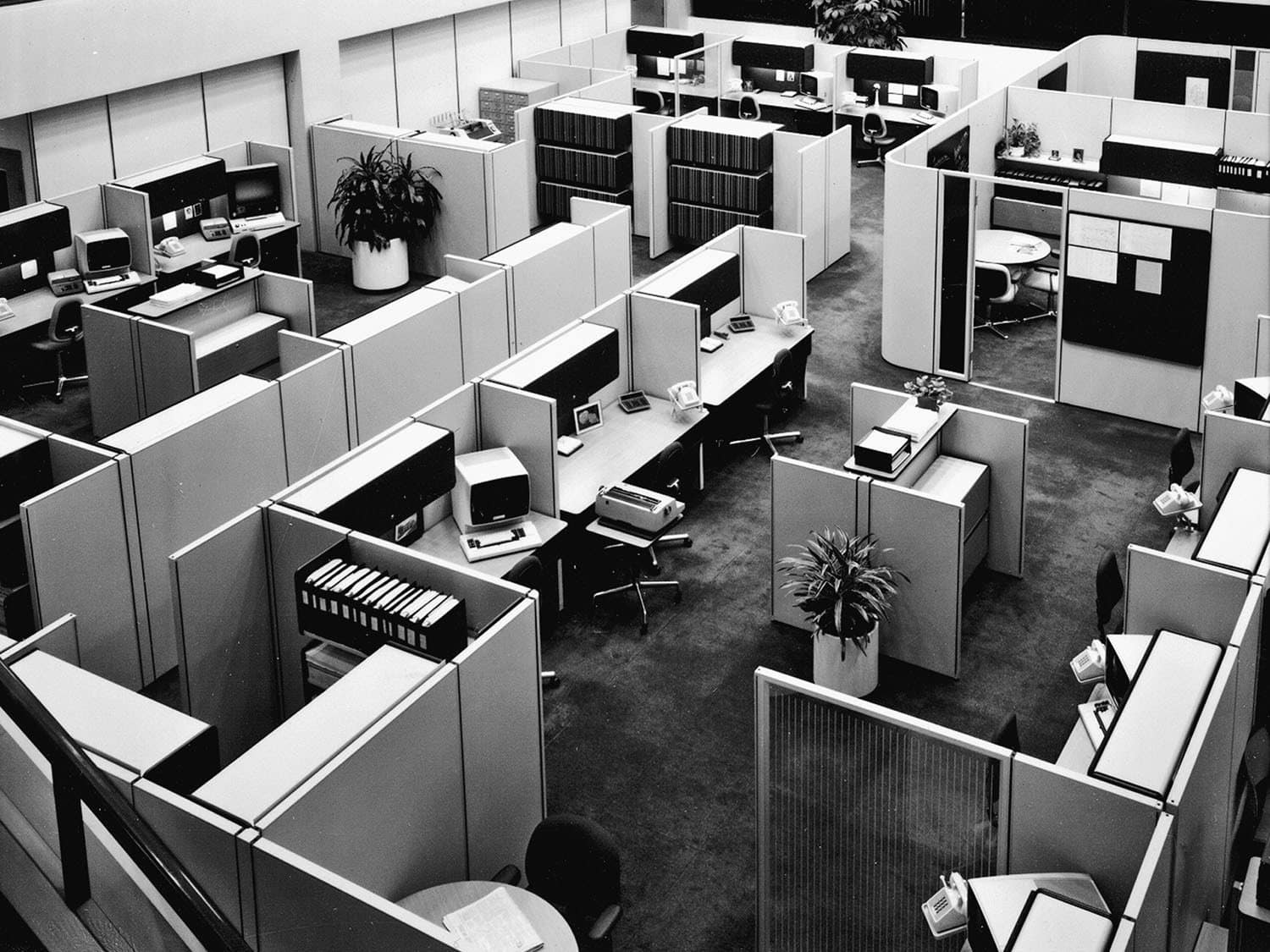 The stereotypical office cube farm environment has been a fertile source of humor, inspiring the Dilbert comic strip, the movie Office Space and both the British and US versions of the television series The Office. But Hermann Miller's 1967 Action Office II by designer Robert Probst was well received as a positive step when it was new. In time however, space planners crammed more and more of the units into offices, as shown in this photo.